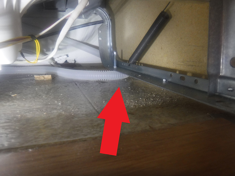 Dishwasher installed on top of drain line