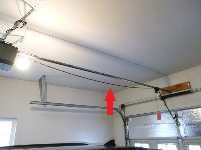 Garage door opener chain is loose