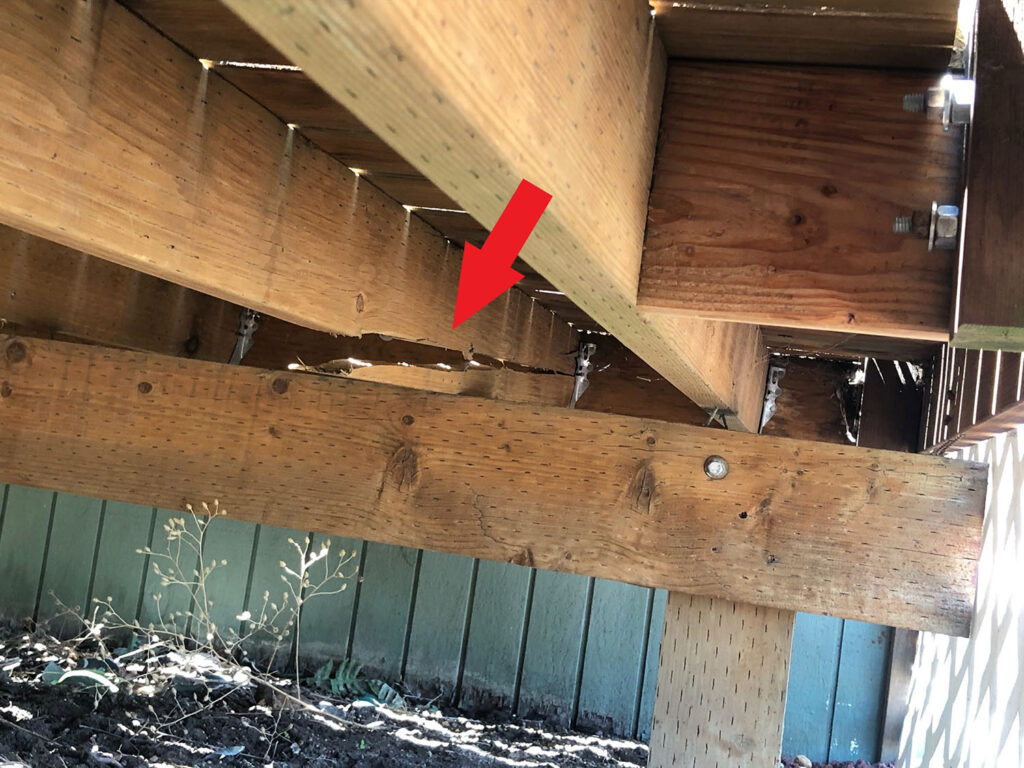 deck joist cracked and weakened - home inspections